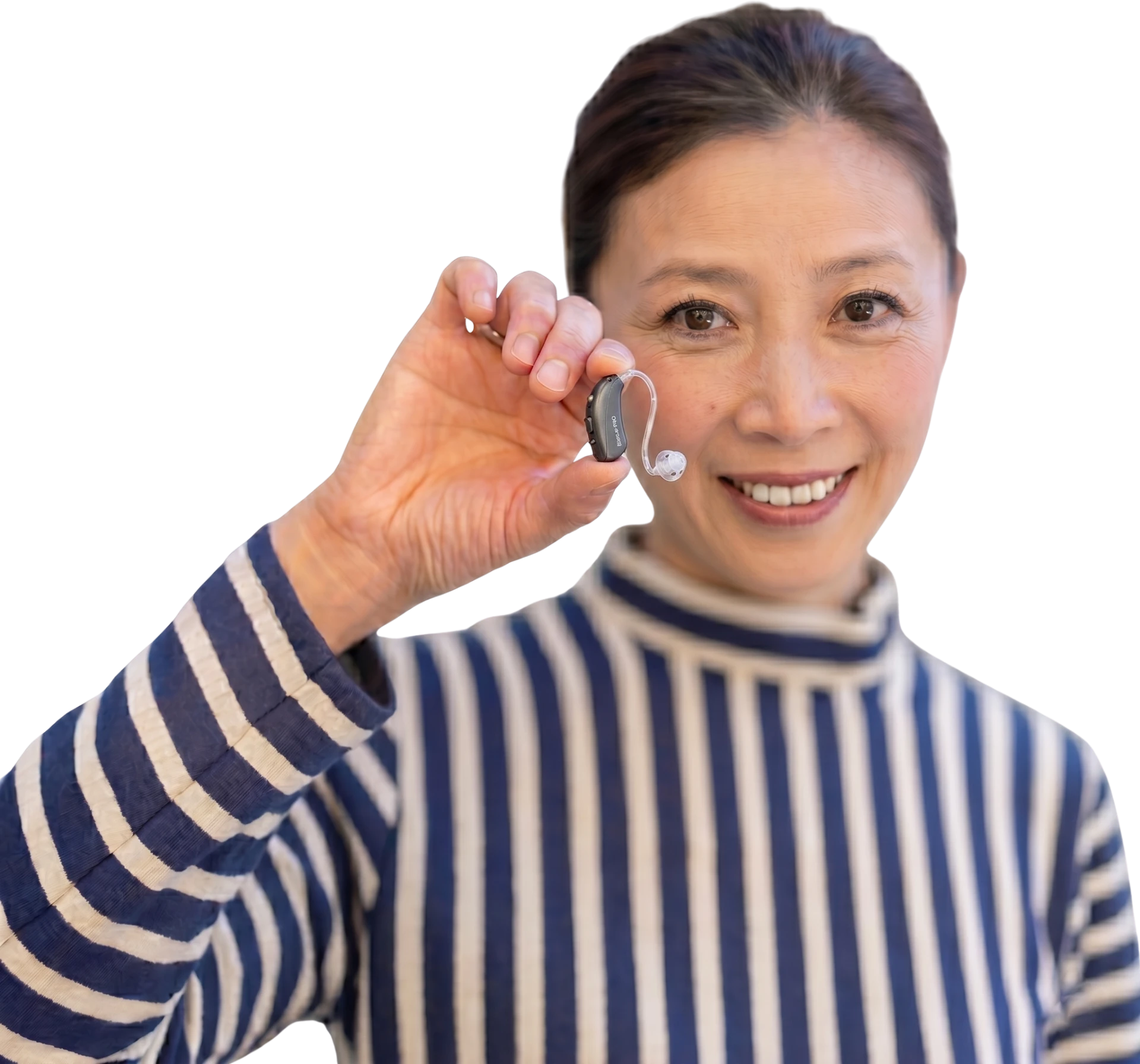 woman holding hearing aid